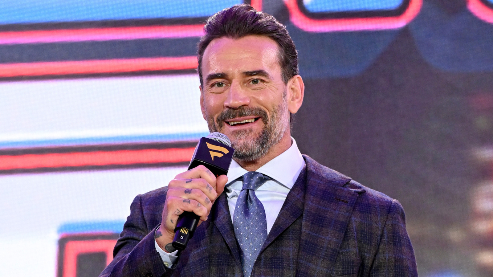 WWE Star CM Punk Reveals Whether He Intends To Write A Book About His Career