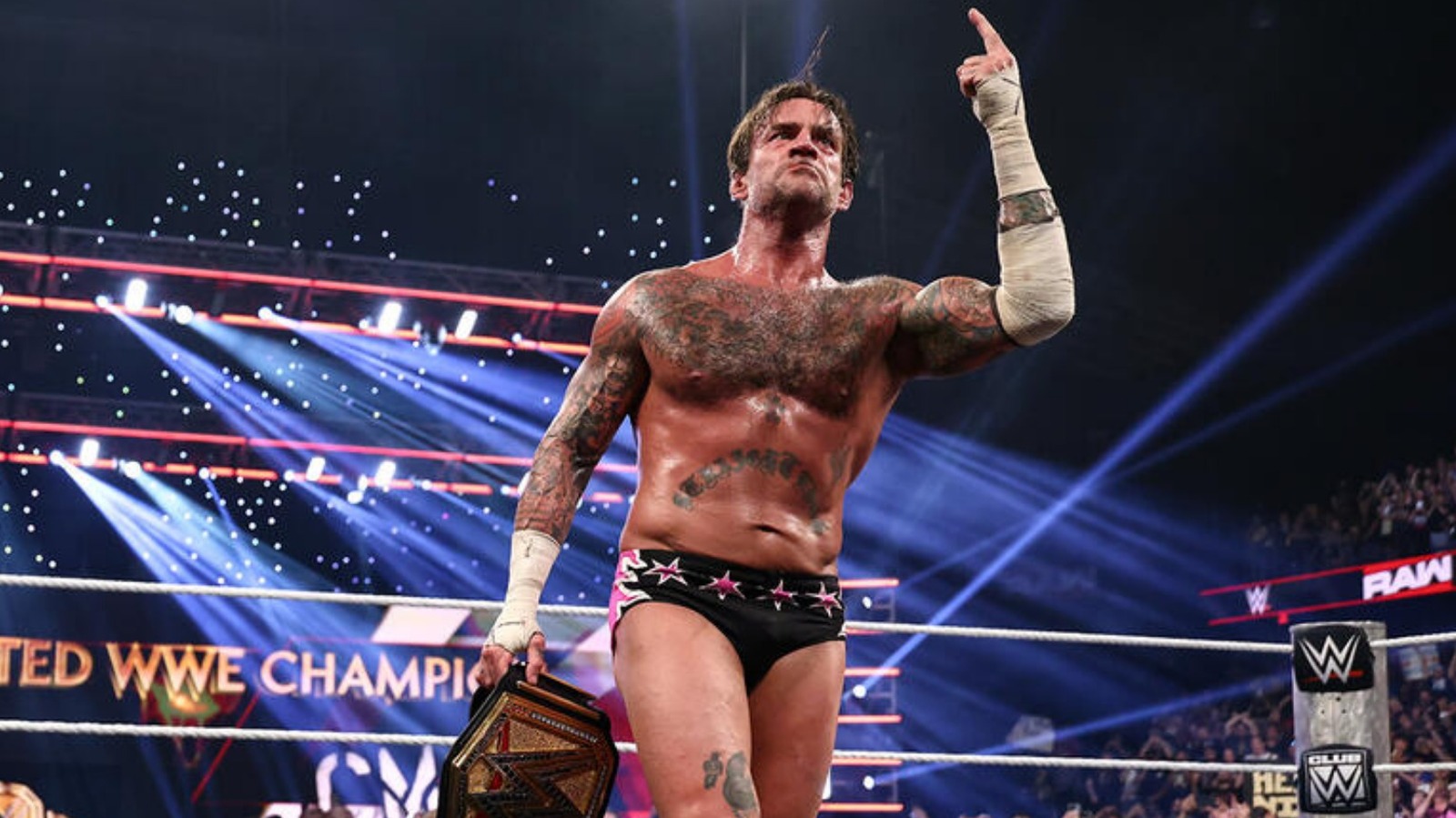 CM Punk Recreates Throwback Photo Following WWE Raw World Title Win